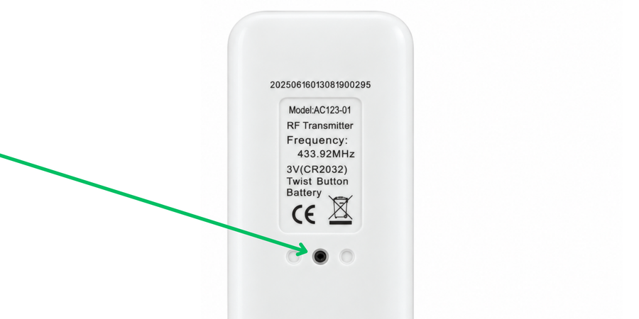 The PROG button on the back of the remote