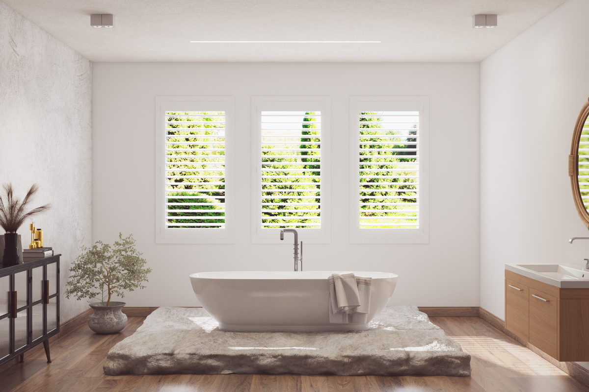 A bathroom with plantation shutters. 